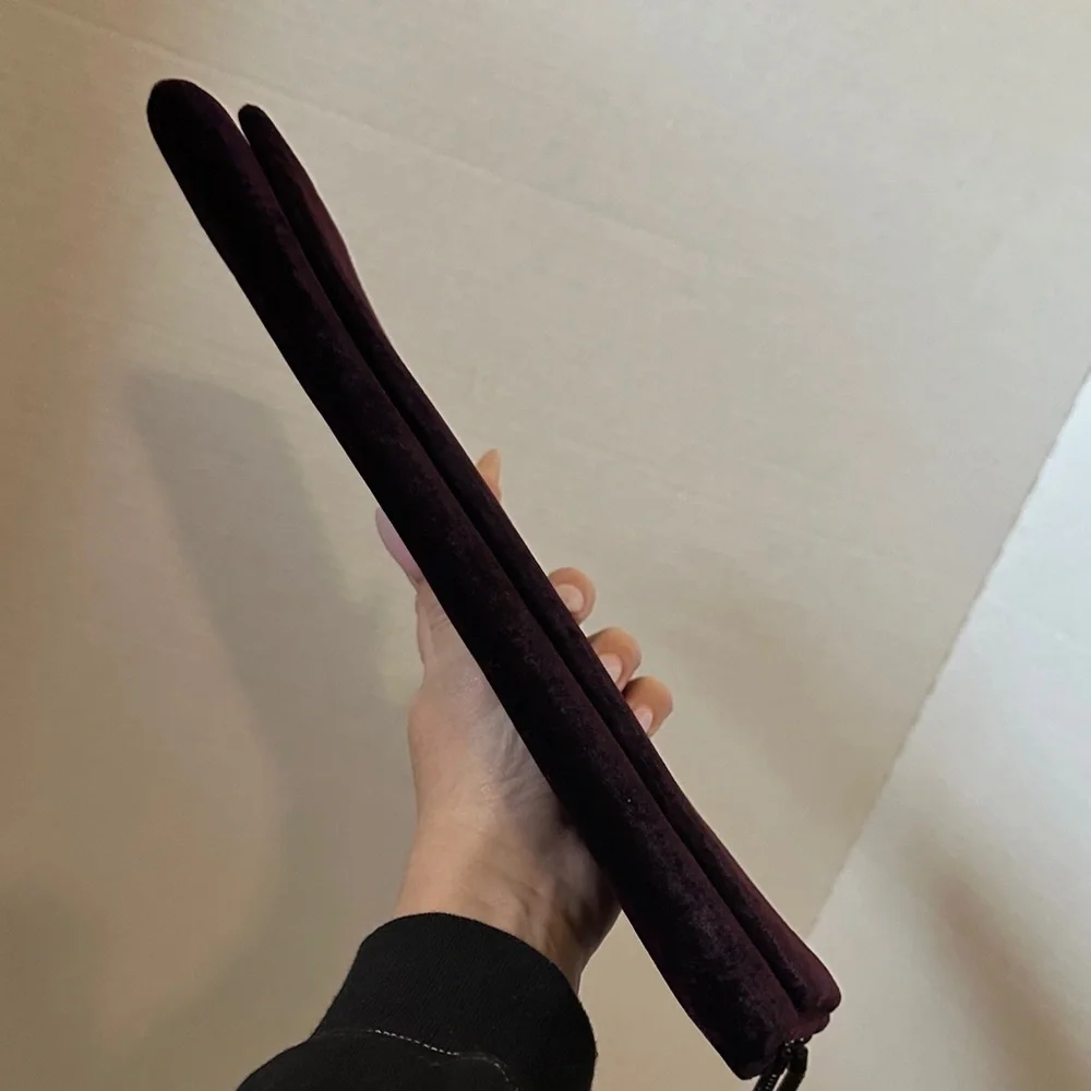 Worth NY long and skinny plum Clutch Wristlet